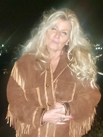 Tina Weaver smiling outdoors